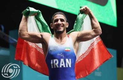 المصارع الایراني عموزاد يفوز بالذهبية